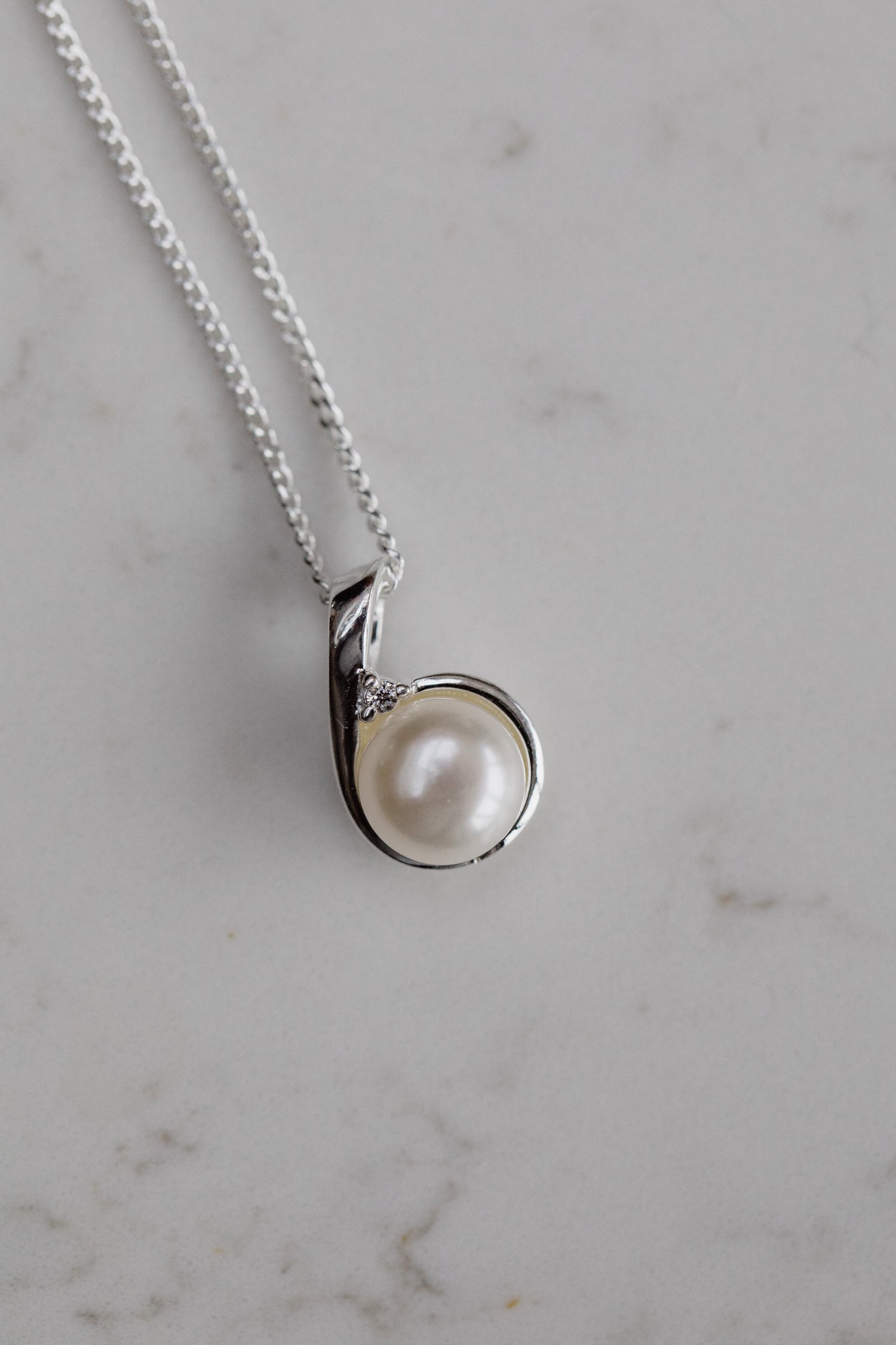 APOSTROPHE • CZ and Pearl Pendant