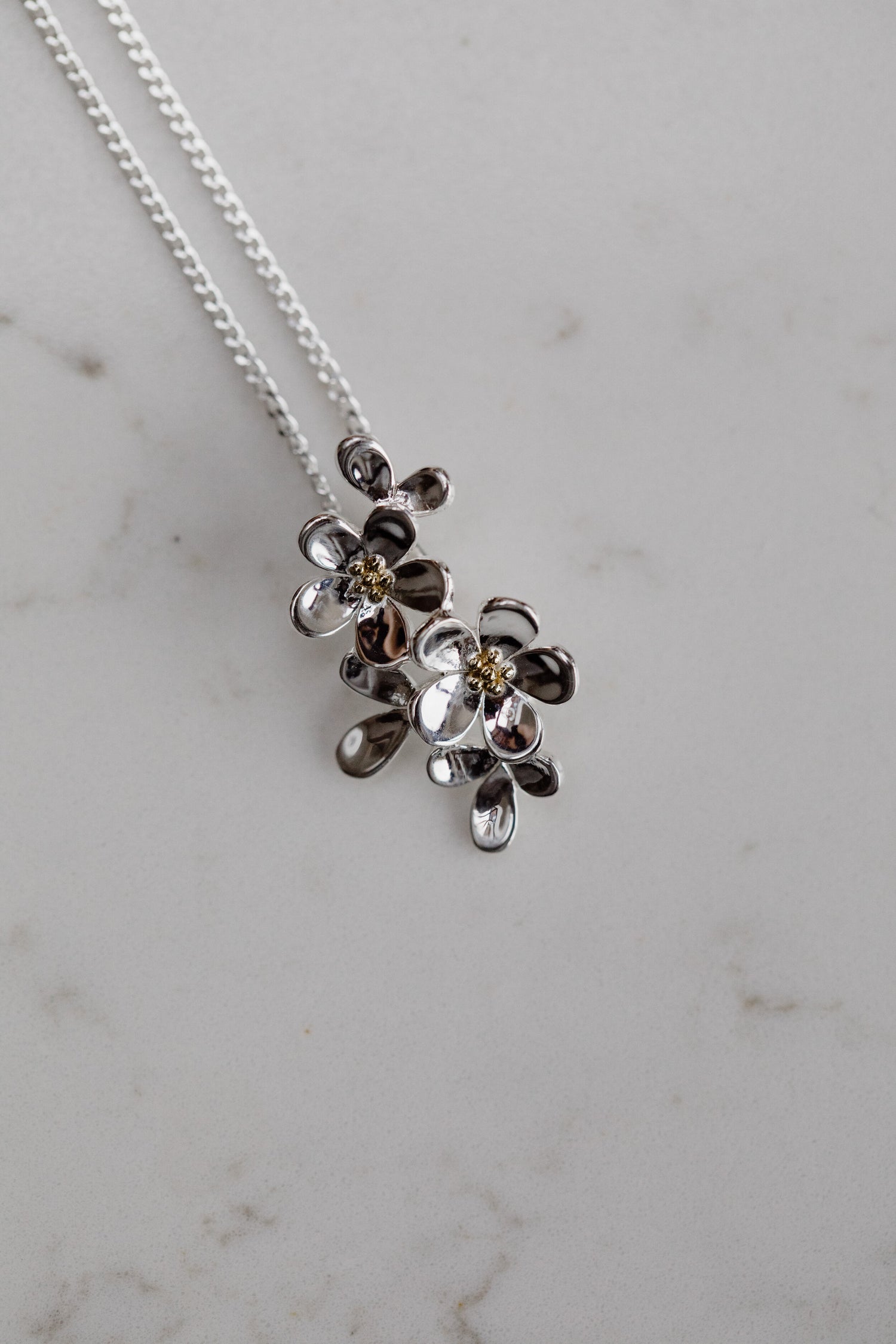 DAISEE • Silver Flower Pendant