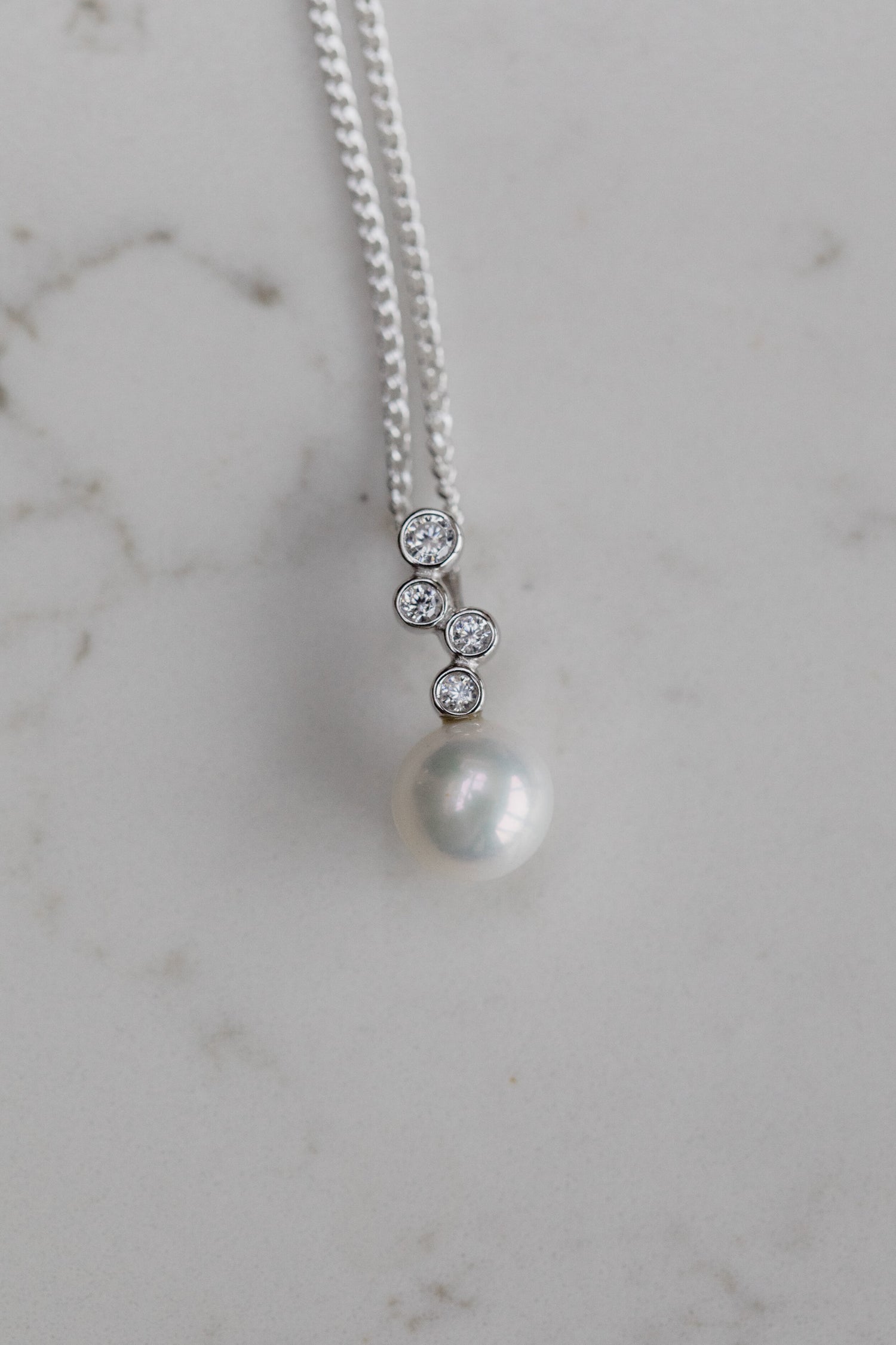 DAZZLE • CZ and Pearl Pendant